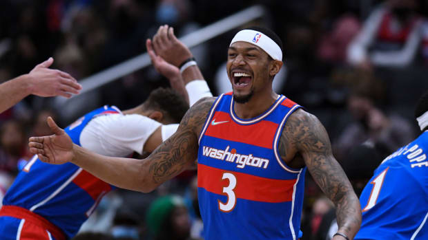 Washington Wizards guard Bradley Beal (3) smiles while entering the court before the game against the Boston Celtics at Capital One Arena
